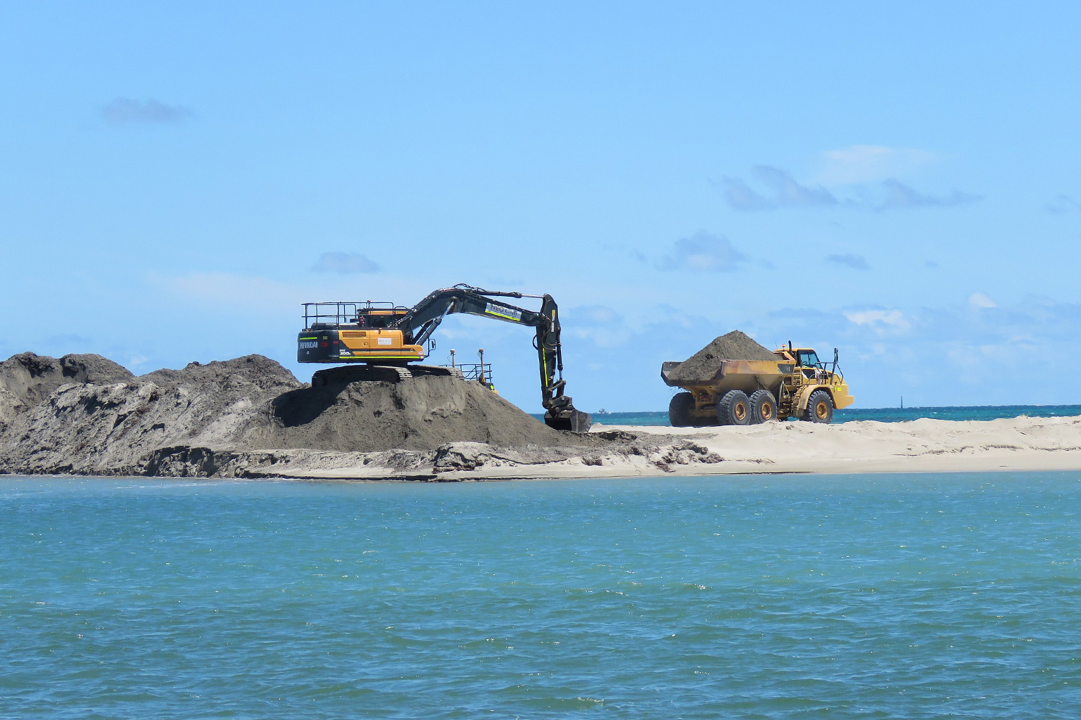 Sand mining operation at golden hour